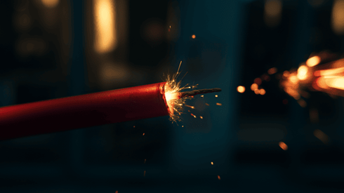 A lit stick of dynamite that is about to explode