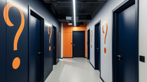 Office hallway with question marks on the walls