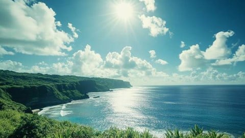 blue ocean and green mountain beach with sun in the blue sky in the Northern Mariana Islands