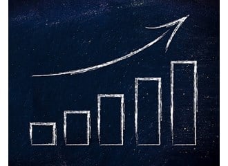 Drawing of graph with arrowing curving upward on dark background
