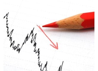 Black line graph with red pencil and red arrow showing negative trend line
