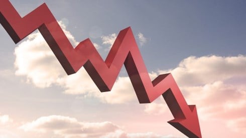 Red arrow pointing down against sky