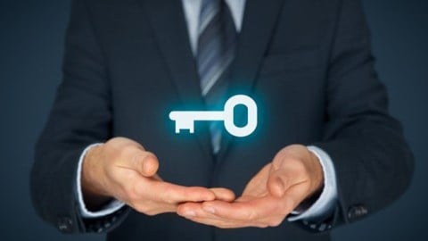 Businessman Holding Glowing Key