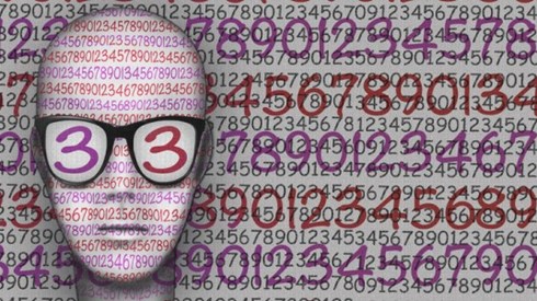Human head wearing glasses with numbers in the lenses and surrounded by numbers