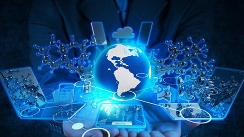 Businessman holding hands out with globe, technology and "map" of network