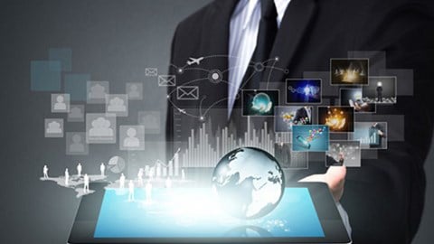 Businessman holding tablet with 3D global icons