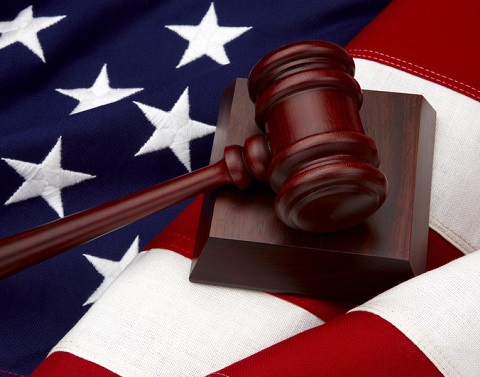 Gavel and base lying on the American flag