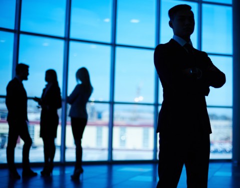 Business Leader In Front Of Window